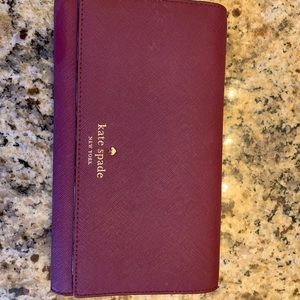 Kate spade trifold wallet in shade wine
